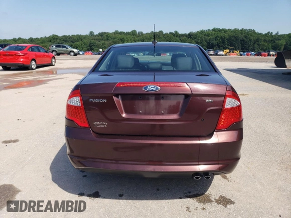 2012 Ford Fusion SE with VIN 3FAHP0HA1CR213206, listed as a Copart auction lot 63248805 with 246,465 mi miles and Salvage title. Bid and sale history available at DreamBid. Image 6.
