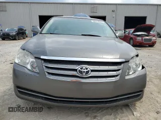 2007 Toyota Avalon XL z VIN 4T1BK36B67U191919, wystawiony jako Copart lot #56274055 z przebiegiem 188 679 mil mil oraz Szkoda całkowita • Salvage title. Historia ofert i sprzedaży dostępna na DreamBid. Obrazek 5.