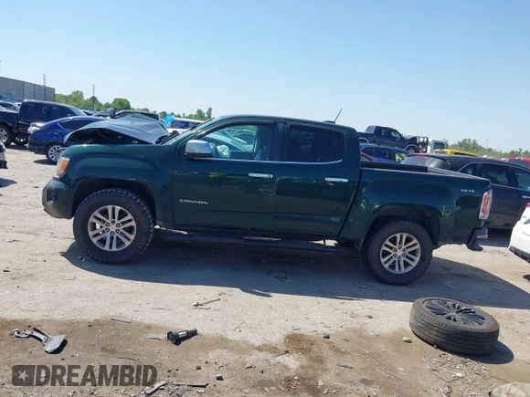 2016 GMC Canyon 4WD SLT z VIN 1GTG6DE30G1150573, wystawiony jako IAAI lot #41969678 z przebiegiem 130 197 mil mil oraz . Historia ofert i sprzedaży dostępna na DreamBid. Obrazek 14.