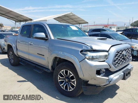 2021 Toyota Tacoma SR with VIN 3TMCZ5AN6MM393306, listed as a IAAI auction lot 42094095 with 57,217 mi miles and . Bid and sale history available at DreamBid. Image 1.