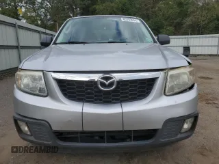 2011 Mazda Tribute Touring with VIN 4F2CY0C70BKM06723, listed as a Copart auction lot 80783624 with 218,372 mi miles and Salvage Title. Bid and sale history available at carsss.com. Image 5.