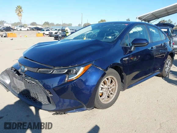 2021 Toyota Corolla Hybrid LE with VIN JTDEAMDEXMJ018828, listed as a IAAI auction lot 41633192 with 63,302 mi miles. Bid and sale history available at carsss.com. Image 18.