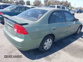 2003 Honda Civic LX with VIN 2HGES16553H559537, listed as a IAAI auction lot 42225418 with 239,140 mi miles and . Bid and sale history available at DreamBid. Image 4.