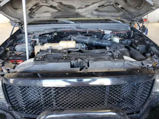 1999 Ford F-350 XL z VIN 1FTSW31S9XED72877, wystawiony jako Copart lot #77412084 z przebiegiem 449 967 mil mil oraz Szkoda całkowita • Salvage title. Historia ofert i sprzedaży dostępna na DreamBid. Obrazek 11.