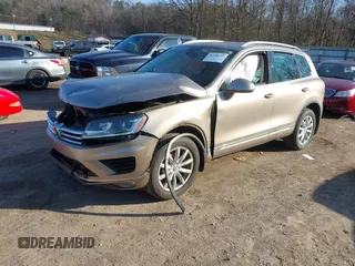 2016 Volkswagen Touareg Sport with VIN WVGEF9BP0GD003241, listed as a IAAI auction lot 41498797 with 90,141 mi miles and . Bid and sale history available at DreamBid. Image 17.