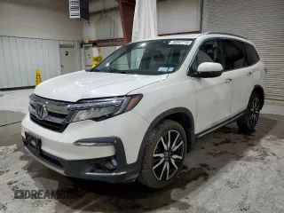 2019 Honda Pilot Touring 8-Passenger z VIN 5FNYF6H98KB043822, wystawiony jako Copart lot #52047715 z przebiegiem 132 851 mil mil oraz Szkoda całkowita • Salvage title. Historia ofert i sprzedaży dostępna na DreamBid. Obrazek 1.