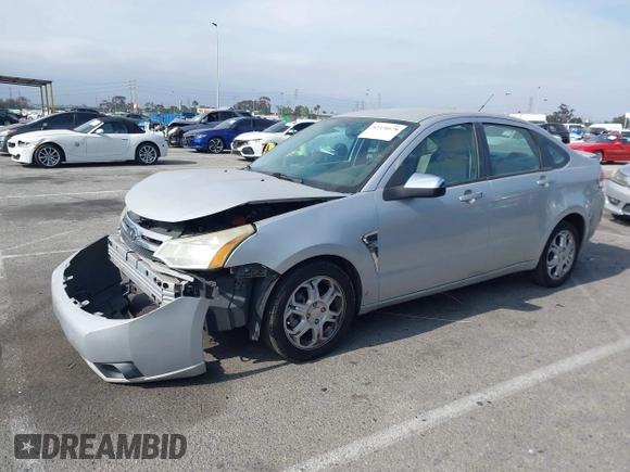 2008 Ford Focus SE with VIN 1FAHP35N98W243888, listed as a IAAI auction lot 42370178 with 141,269 mi miles and . Bid and sale history available at DreamBid. Image 2.