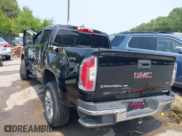 2018 GMC Canyon 4WD SLT with VIN 1GTG6DEN5J1131459, listed as a IAAI auction lot 39954201 with 146,721 mi miles and . Bid and sale history available at carsss.com. Image 3.