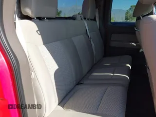 2010 Ford F-150 XL with VIN 1FTEX1C85AKB46148, listed as a IAAI auction lot 42003004 with 216,542 mi miles. Bid and sale history available at carsss.com. Image 8.