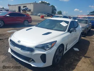 2020 Kia Stinger GT-Line with VIN KNAE15LA3L6083846, listed as a IAAI auction lot 40334265 with 83,627 mi miles. Bid and sale history available at carsss.com. Image 2.