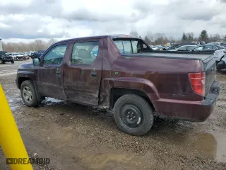 2010 Honda Ridgeline RT with VIN 5FPYK1F23AB008602, listed as a Copart auction lot 52180695 with 144,878 mi miles and Salvage Title. Bid and sale history available at carsss.com. Image 2.