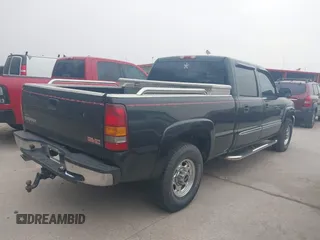 2003 GMC Sierra 1500HD SLE z VIN 1GTGC13U63F241508, wystawiony jako IAAI lot #41736802 z przebiegiem 228 853 mil mil oraz . Historia ofert i sprzedaży dostępna na DreamBid. Obrazek 4.