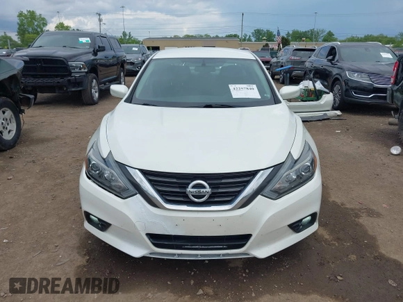 2016 Nissan Altima S z VIN 1N4AL3AP0GC174433, wystawiony jako IAAI lot #42257840 z przebiegiem 122 158 mil mil oraz . Historia ofert i sprzedaży dostępna na DreamBid. Obrazek 13.