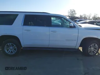 2015 Chevrolet Suburban LT with VIN 1GNSCJKC2FR680413, listed as a IAAI auction lot 41634666 with 127,175 mi miles and . Bid and sale history available at DreamBid. Image 13.
