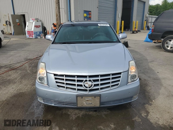 2006 Cadillac DTS 1SC z VIN 1G6KD57Y36U186630, wystawiony jako Copart lot #60792235 z przebiegiem 137 670 mil mil oraz Czysty tytuł • Clean title. Historia ofert i sprzedaży dostępna na DreamBid. Obrazek 5.
