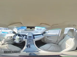 2014 Ford Taurus SEL z VIN 1FAHP2E88EG174797, wystawiony jako Copart lot #53961615 z przebiegiem Nie podano mil oraz Szkody całkowita. Historia ofert i sprzedaży dostępna na DreamBid. Obrazek 14.