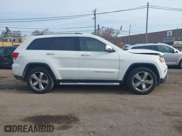 2014 Jeep Grand Cherokee Limited with VIN 1C4RJEBG6EC157551, listed as a IAAI auction lot 42006861 with 159,536 mi miles and . Bid and sale history available at DreamBid. Image 13.