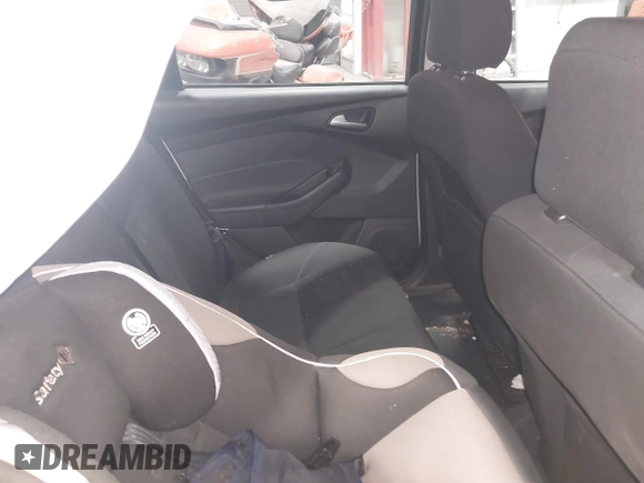 2015 Ford Focus SE with VIN 1FADP3F24FL272863, listed as a IAAI auction lot 41561084 with 103,875 mi miles. Bid and sale history available at carsss.com. Image 8.