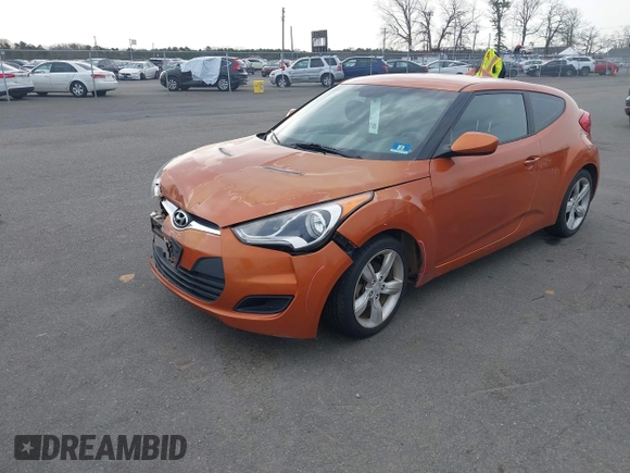2013 Hyundai Veloster w/Black Int с VIN KMHTC6AD0DU122635, выставлен на аукционе IAAI как лот 41768900 с пробегом 110 358 миль миль и . История ставок и продаж доступна на DreamBid. Изображение 2.