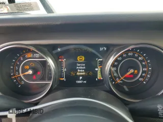2023 Jeep Wrangler Willys with VIN 1C4HJXDG2PW671483, listed as a Copart auction lot 46990395 with 15,087 mi miles and Salvage Title. Bid and sale history available at DreamBid. Image 9.