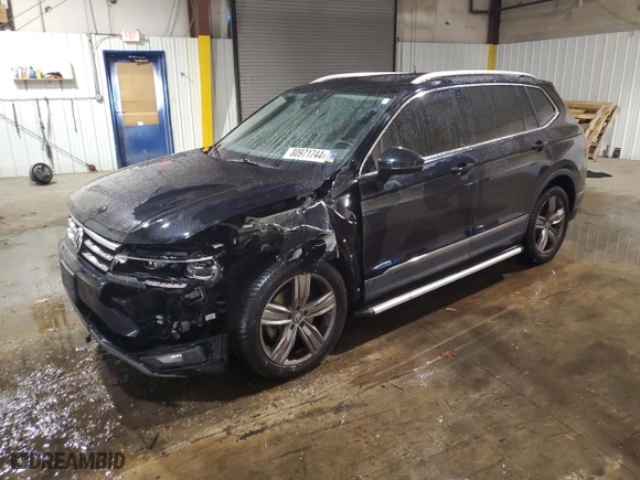 2018 Volkswagen Tiguan SEL Premium with VIN 3VV5B7AX7JM003594, listed as a Copart auction lot 80971744 with 79,898 mi miles and Salvage Title. Bid and sale history available at carsss.com. Image 1.
