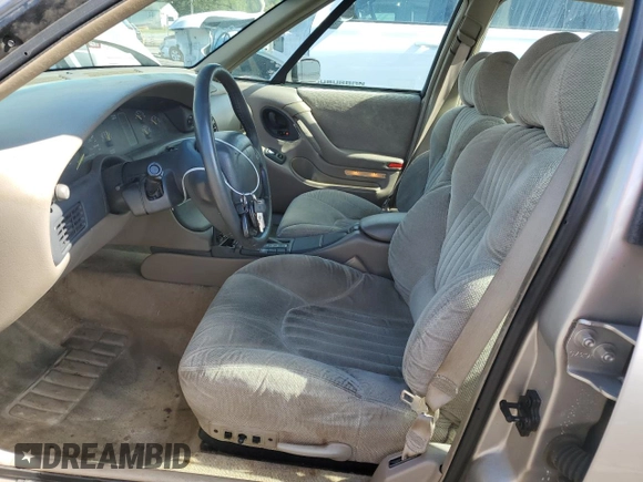 1997 Pontiac Bonneville SE z VIN 1G2HX52K7VH211607, wystawiony jako Copart lot #73705454 z przebiegiem 116 307 mil mil oraz Szkoda całkowita • Salvage title. Historia ofert i sprzedaży dostępna na DreamBid. Obrazek 7.