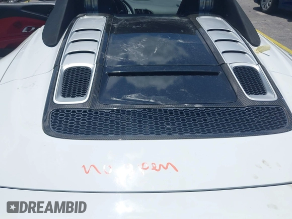 2017 Audi R8 z VIN WUAVACFX0H7903232, wystawiony jako IAAI lot #42247728 z przebiegiem 74 755 mil mil oraz . Historia ofert i sprzedaży dostępna na DreamBid. Obrazek 10.