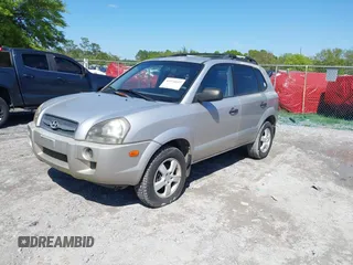 2006 Hyundai Tucson GL with VIN KM8JM12BX6U249982, listed as a IAAI auction lot 41976033 with 107,153 mi miles. Bid and sale history available at carsss.com. Image 18.