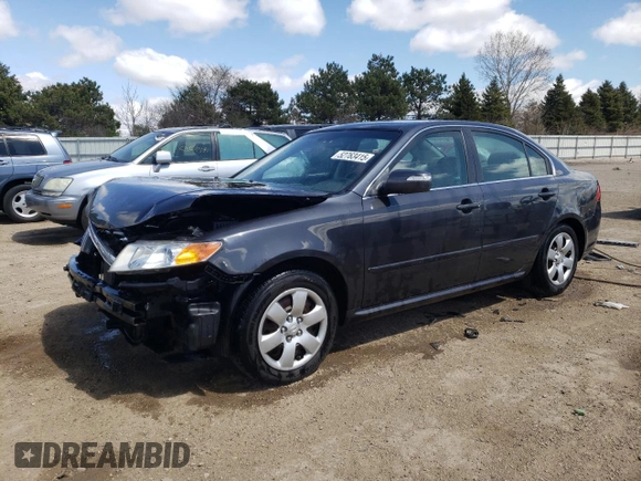 2010 Kia Optima LX z VIN KNAGG4A86A5451165, wystawiony jako Copart lot #52763415 z przebiegiem 213 958 mil mil oraz Szkoda całkowita • Salvage title. Historia ofert i sprzedaży dostępna na DreamBid. Obrazek 1.