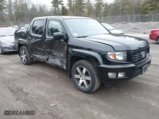 2014 Honda Ridgeline SE with VIN 5FPYK1F66EB005881, listed as a IAAI auction lot 41977349 with 184,567 mi miles. Bid and sale history available at carsss.com. Image 1.