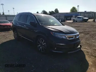 2020 Honda Pilot Touring 8-Passenger with VIN 5FNYF5H95LB021658, listed as a Copart auction lot 58878594 with 36,122 mi miles and Salvage Title. Bid and sale history available at DreamBid. Image 11.