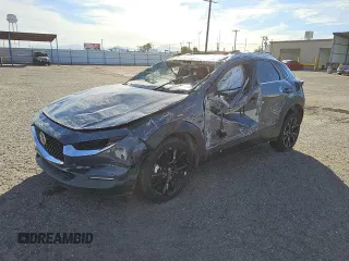 2022 Mazda CX-30 S Carbon Edition с VIN 3MVDMBCL0NM441623, выставлен на аукционе Copart как лот 82000034 с пробегом Не указан миль и Списание • Salvage title. История ставок и продаж доступна на DreamBid. Изображение 1.