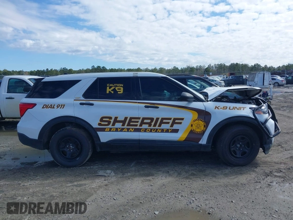 2022 Ford Police Interceptor Utility z VIN 1FM5K8AB9NGA26864, wystawiony jako IAAI lot #41629292 z przebiegiem Nie podano mil oraz . Historia ofert i sprzedaży dostępna na DreamBid. Obrazek 13.