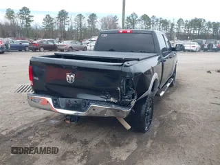 2016 Ram 2500 z VIN 3C6TR4DT2GG374847, wystawiony jako IAAI lot #41745565 z przebiegiem 164 099 mil mil oraz . Historia ofert i sprzedaży dostępna na DreamBid. Obrazek 4.