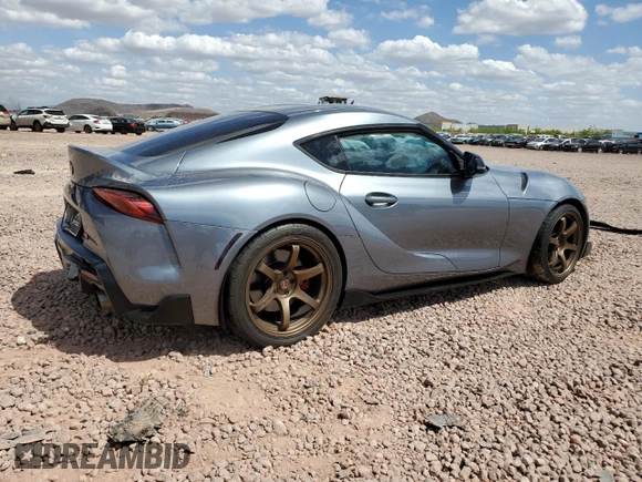 2021 Toyota Supra 3.0 z VIN WZ1DB0C02MW035473, wystawiony jako Copart lot #52582315 z przebiegiem Nie podano mil oraz Szkoda całkowita • Salvage title. Historia ofert i sprzedaży dostępna na DreamBid. Obrazek 3.