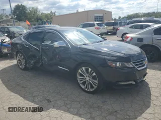 2014 Chevrolet Impala LTZ with VIN 1G1155S38EU169167, listed as a Copart auction lot 73174254 with 156,884 mi miles and Salvage Title. Bid and sale history available at DreamBid. Image 4.