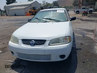 2003 Nissan Sentra XE z VIN 3N1CB51D83L696512, wystawiony jako IAAI lot #42454628 z przebiegiem 194 629 mil mil oraz . Historia ofert i sprzedaży dostępna na DreamBid. Obrazek 6.
