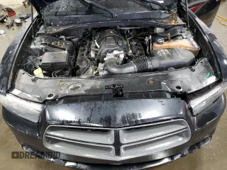 2012 Dodge Charger Police z VIN 2C3CDXAT4CH240370, wystawiony jako Copart lot #58941035 z przebiegiem 140 187 mil mil oraz Szkoda całkowita • Salvage title. Historia ofert i sprzedaży dostępna na DreamBid. Obrazek 11.