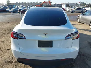 2023 Tesla Model Y Long Range with VIN 7SAYGDEE1PA128818, listed as a IAAI auction lot 41622062 with 19,089 mi miles. Bid and sale history available at carsss.com. Image 17.