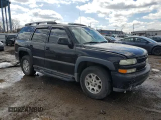 2003 Chevrolet Tahoe LS with VIN 1GNEK13ZX3R175556, listed as a Copart auction lot 50123875 with 193,444 mi miles and Salvage Title. Bid and sale history available at DreamBid. Image 4.