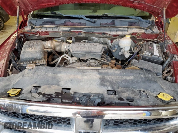 2012 Ram 1500 ST with VIN 1C6RD6FP1CS148080, listed as a Copart auction lot 60081415 with 160,985 mi miles and Salvage title. Bid and sale history available at DreamBid. Image 11.