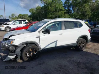 2022 Volkswagen Taos SE z VIN 3VVTX7B2XNM025588, wystawiony jako IAAI lot #39670650 z przebiegiem 45 817 mil mil oraz . Historia ofert i sprzedaży dostępna na DreamBid. Obrazek 14.