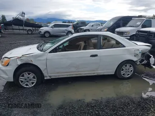 2003 Honda Civic DX with VIN 1HGEM22203L039793, listed as a IAAI auction lot 41916813 with 160,631 mi miles and . Bid and sale history available at carsss.com. Image 14.