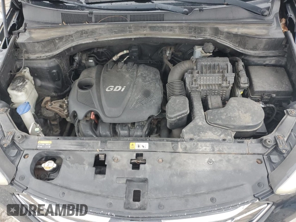 2013 Hyundai Santa Fe Sport z VIN 5XYZU3LB0DG070608, wystawiony jako Copart lot #50056275 z przebiegiem 207 019 mil mil oraz Szkoda całkowita • Salvage title. Historia ofert i sprzedaży dostępna na DreamBid. Obrazek 12.