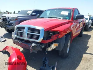2006 Dodge Dakota SLT z VIN 1D7HE48NX6S588584, wystawiony jako IAAI lot #42348429 z przebiegiem 246 965 mil mil oraz . Historia ofert i sprzedaży dostępna na DreamBid. Obrazek 2.