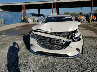 2017 Mazda CX-9 Grand Touring z VIN JM3TCADYXH0127867, wystawiony jako Copart lot #82352204 z przebiegiem 129 349 mil mil oraz Szkoda całkowita • Salvage title. Historia ofert i sprzedaży dostępna na DreamBid. Obrazek 14.