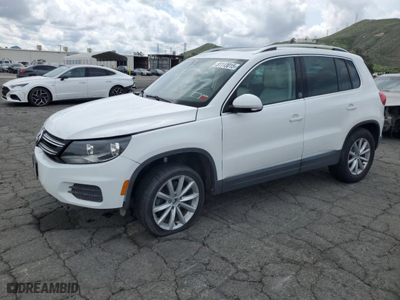 2017 Volkswagen Tiguan Wolfsburg Edition with VIN WVGSV7AX0HK014796, listed as a Copart auction lot 51113015 with 51,592 mi miles and Salvage Title. Bid and sale history available at carsss.com. Image 1.