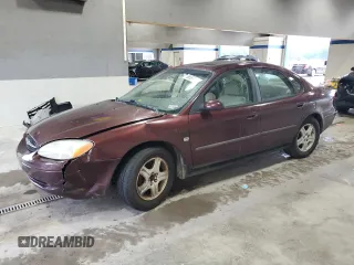 2000 Ford Taurus SEL with VIN 1FAFP56S8YG157084, listed as a Copart auction lot 56597285 with 114,707 mi miles and Salvage title. Bid and sale history available at DreamBid. Image 1.
