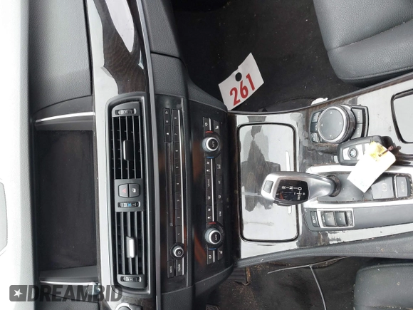 2015 BMW 5 Series 528i with VIN WBA5A5C56FD514814, listed as a IAAI auction lot 42052381 with 76,306 mi miles. Bid and sale history available at carsss.com. Image 11.