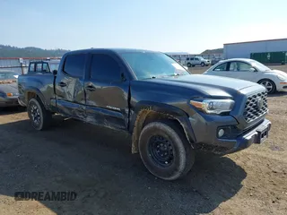 2022 Toyota Tacoma SR5 with VIN 3TMDZ5BN3NM127455, listed as a IAAI auction lot 42584752 with 64,007 mi miles and . Bid and sale history available at DreamBid. Image 1.
